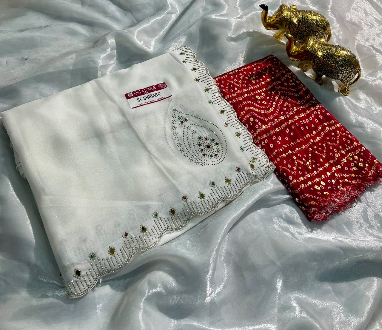 SF-CHIRAG-2 STAR GEORGETTE FABRIC SAREE WITH BEAUTIFUL DESIGN WITH MIRROR WORK WITH DMC SIROSKI WORK WITH BEAUTIFUL CONTRAST BANDHANI DESIGN BLOUSE