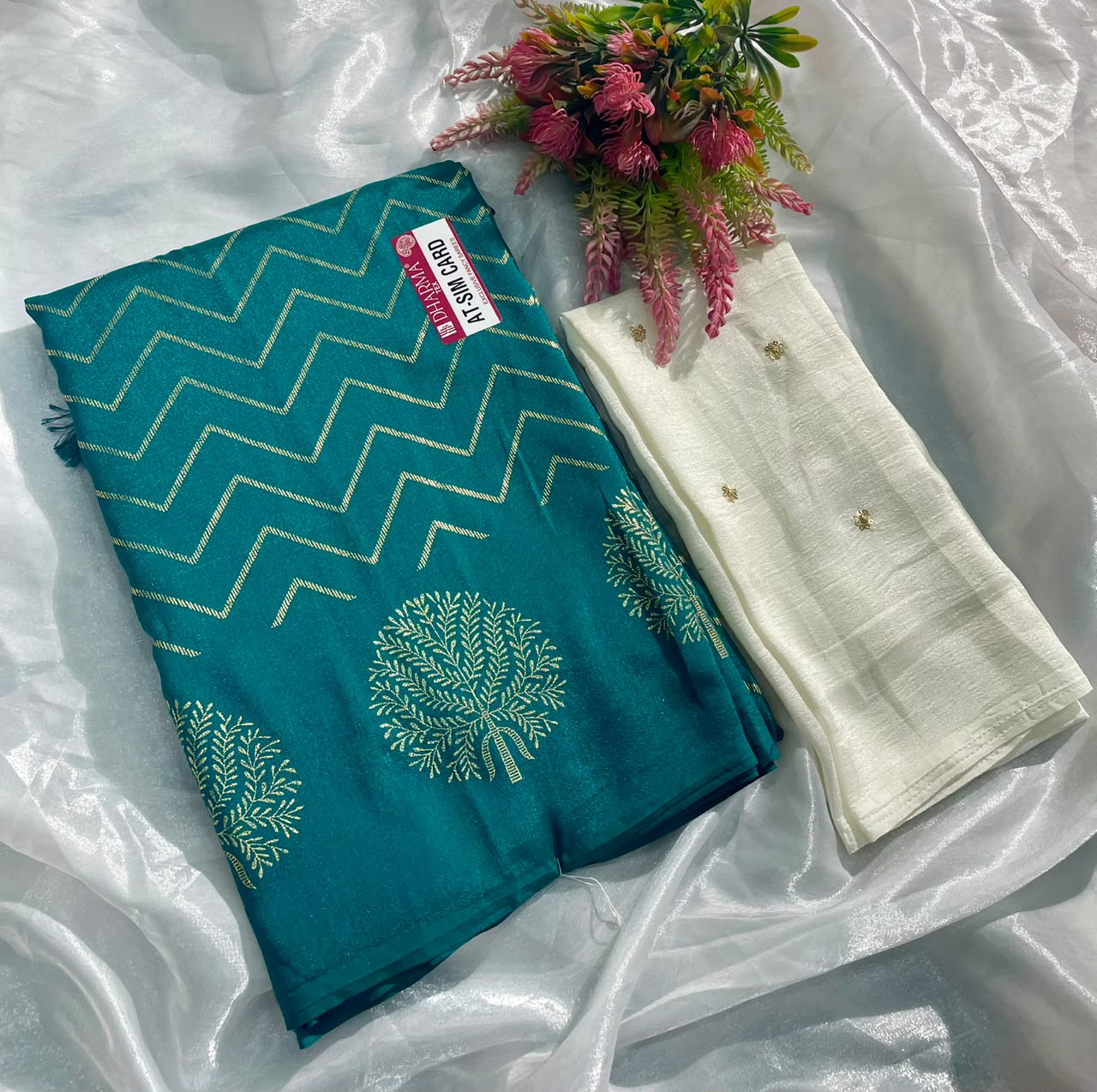 AT-SIM CARD VICHITRA FABRIC SAREE WITH BEAUTIFUL DESIGN WITH ZIGZAG DESIGN WITH BEAUTIFUL BUTTA DESIGN WITH TASSELS WITH BLOUSE