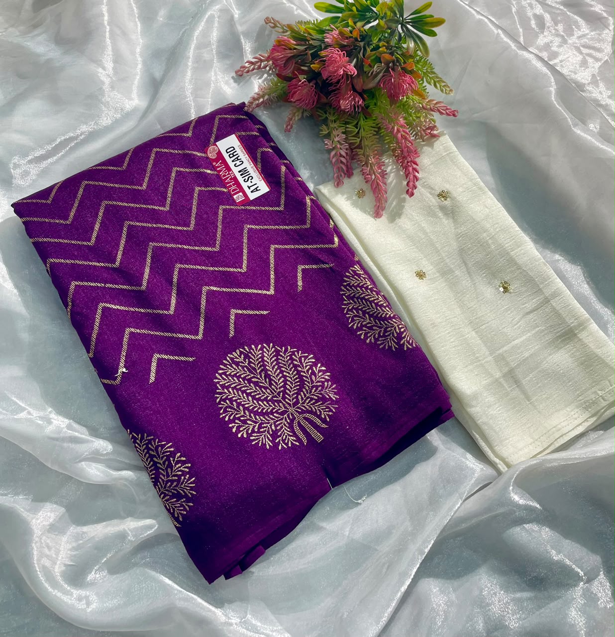 AT-SIM CARD VICHITRA FABRIC SAREE WITH BEAUTIFUL DESIGN WITH ZIGZAG DESIGN WITH BEAUTIFUL BUTTA DESIGN WITH TASSELS WITH BLOUSE