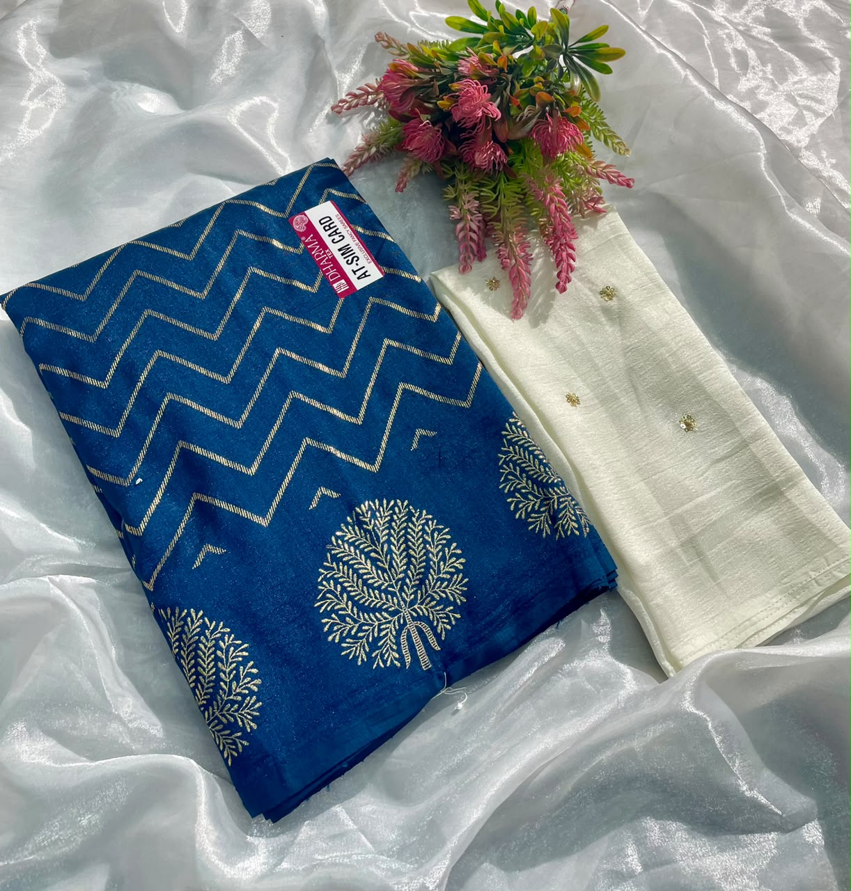 AT-SIM CARD VICHITRA FABRIC SAREE WITH BEAUTIFUL DESIGN WITH ZIGZAG DESIGN WITH BEAUTIFUL BUTTA DESIGN WITH TASSELS WITH BLOUSE
