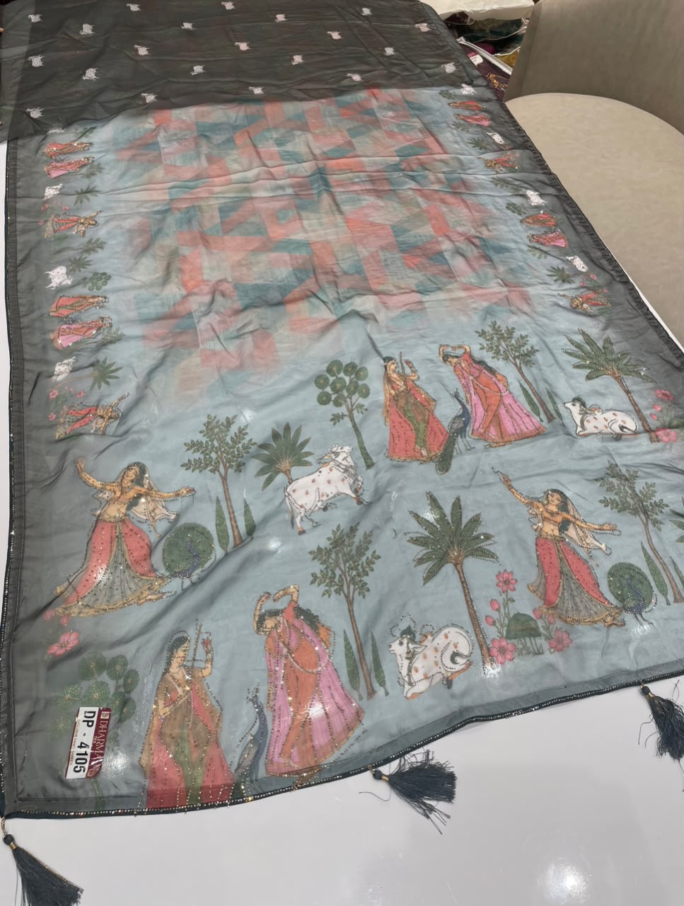 DP-4105 FENDI SATIN FABRIC SAREE WITH BEAUTIFUL DESIGN WITH COW AND OTHER BEAUTIFUL PRINT WITH DMC SIROSKI WORK WITH PIPING AND TASSELS WITH BLOUSE