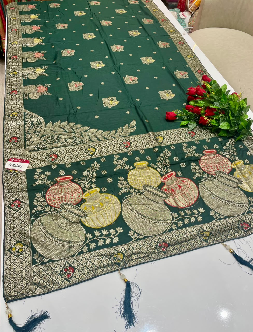 AJ-MATKA-2 DOLA SILK FABRIC SAREE WITH RICH PALLU DESIGN WITH JARKAN WORK WITH BEAUTIFUL MATKA DESIGN ON PALLU WITH MEENAKARI WORK WITH PIPIONG AND TASSELS WITH BLOUSE