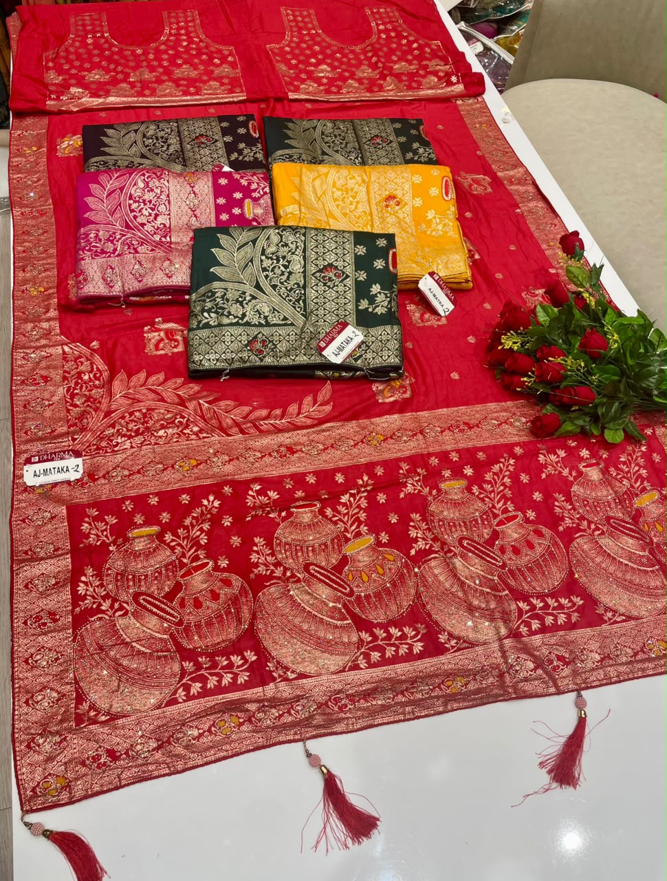 AJ-MATKA-2 DOLA SILK FABRIC SAREE WITH RICH PALLU DESIGN WITH JARKAN WORK WITH BEAUTIFUL MATKA DESIGN ON PALLU WITH MEENAKARI WORK WITH PIPIONG AND TASSELS WITH BLOUSE