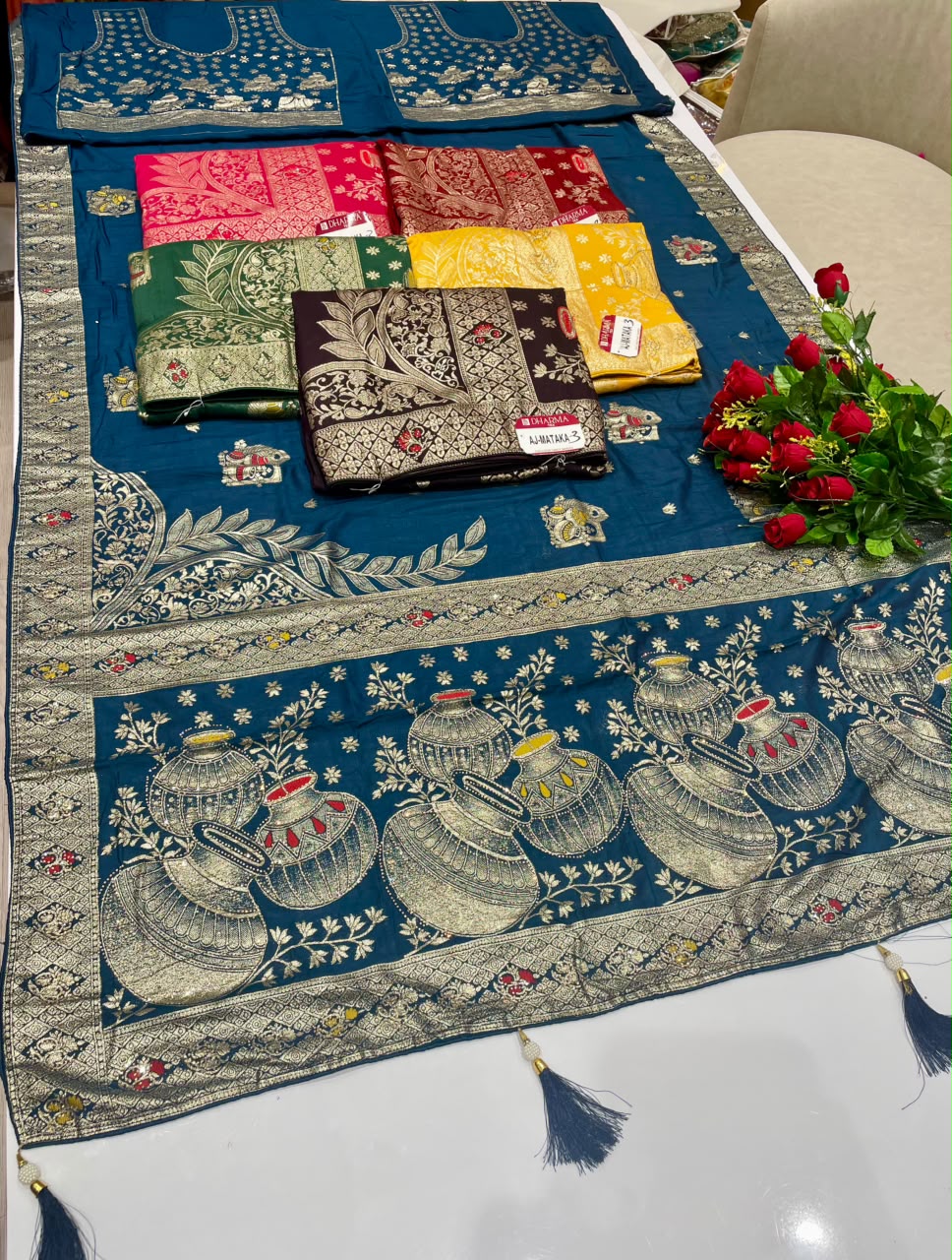AJ-MATKA-3  DOLA SILK FABRIC SAREE WITH RICH PALLU DESIGN WITH JARKAN WORK WITH BEAUTIFUL MATKA DESIGN ON PALLU WITH MEENAKARI WORK WITH PIPIONG AND TASSELS WITH BLOUSE