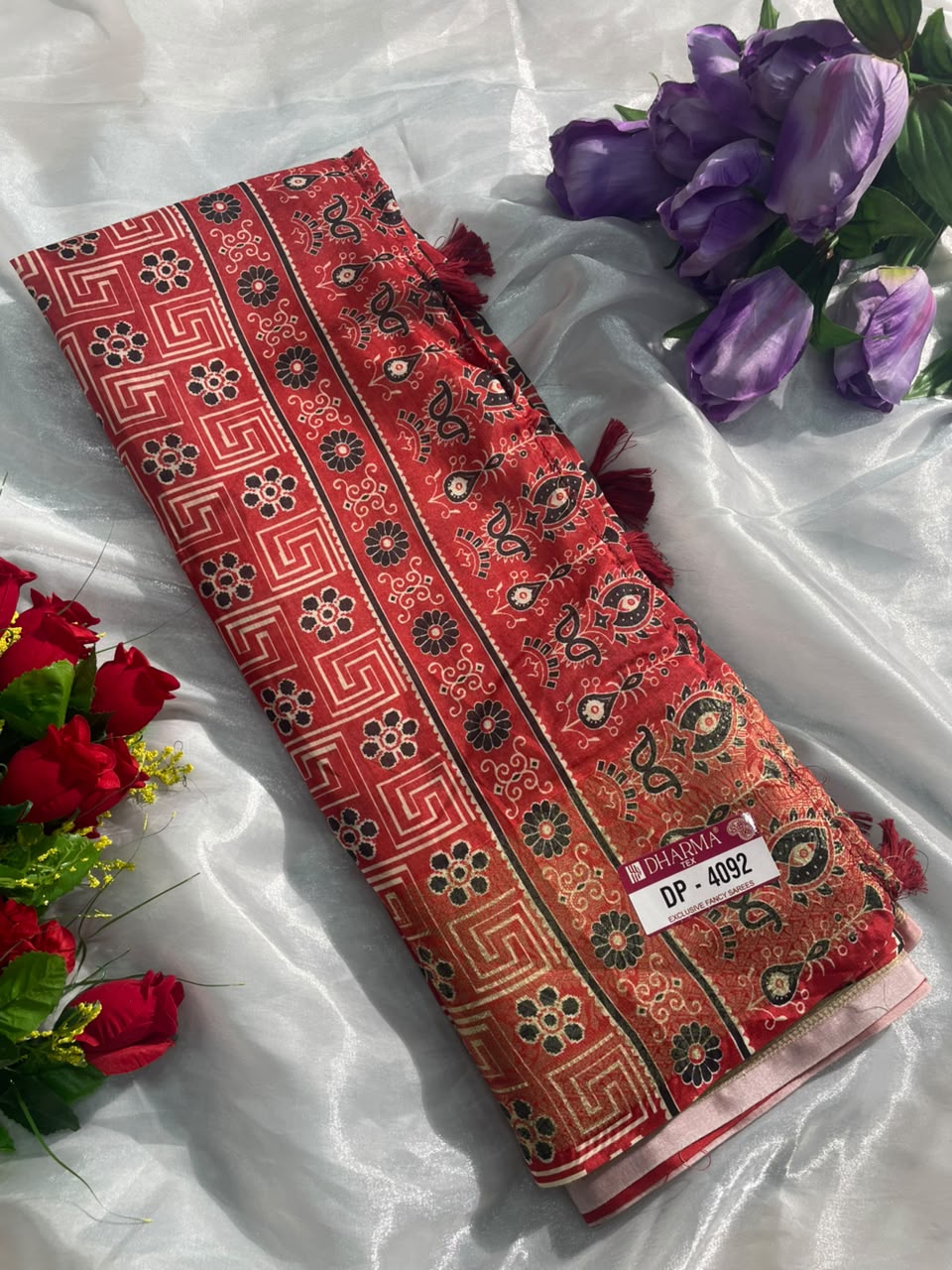 DP-4092 FANCY FABRIC SAREE WITH BEAUTIFUL HEAVY DESIGN WITH RICH PALLU WITH CARRY DESIGN ON SAREE WITH BLOUSE