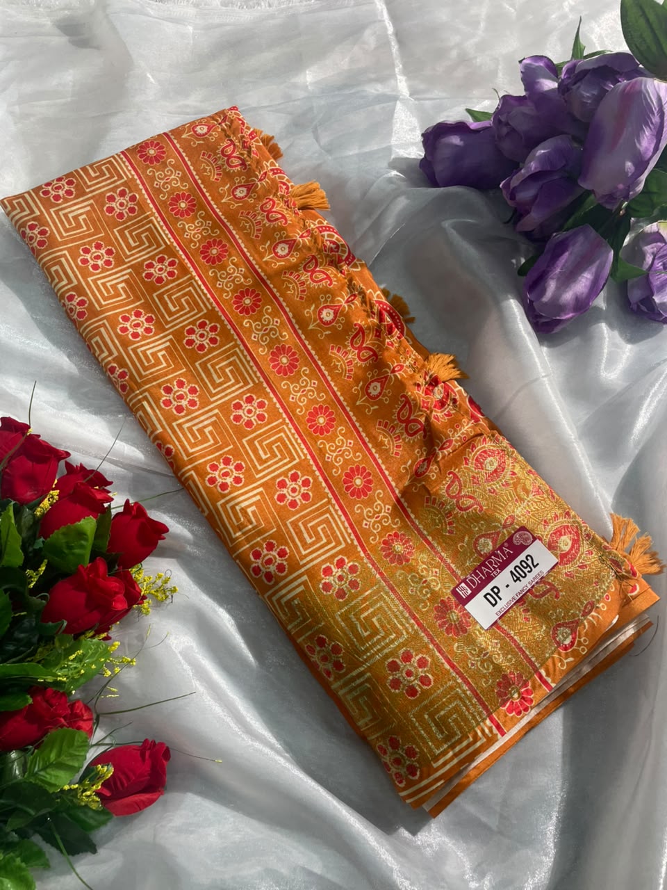 DP-4092 FANCY FABRIC SAREE WITH BEAUTIFUL HEAVY DESIGN WITH RICH PALLU WITH CARRY DESIGN ON SAREE WITH BLOUSE