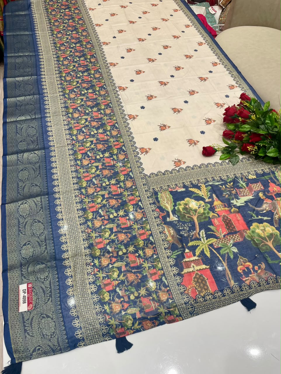 DP-4098 FANCY FABRIC SAREE WITH BEAUTIFUL DESIGN WITH RICH PALLU DESIGN WITH BEAUTIFUL PEACOCK DESIGN ON SAREE WITH ZARI WORK WITH PIPING AND TASSELS WITH BLOUSE