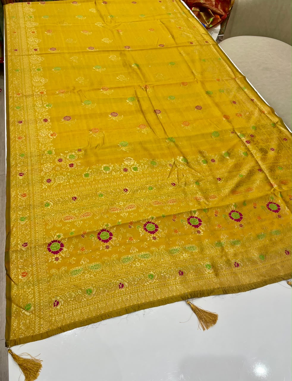 AJ-DHRUVIKA CHAMPION SILK FABRIC SAREE WITH RICH PALLU DESIGN WITH MEENAKARI WORK WITH FLORAL DESIGN WITH BORDER WITH PIPING AND TASSELS WITH BLOUSE
