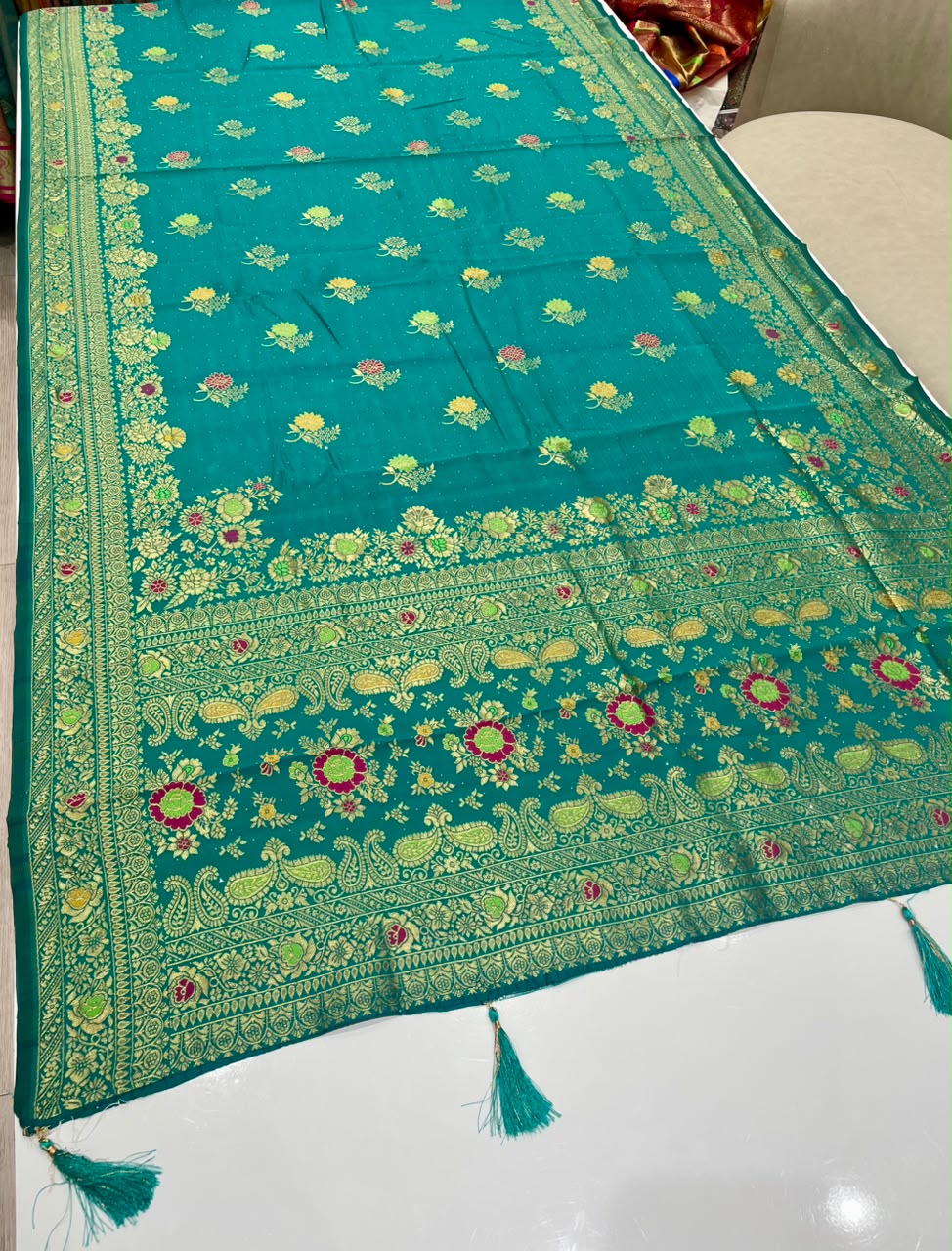 AJ-DHRUVIKA CHAMPION SILK FABRIC SAREE WITH RICH PALLU DESIGN WITH MEENAKARI WORK WITH FLORAL DESIGN WITH BORDER WITH PIPING AND TASSELS WITH BLOUSE