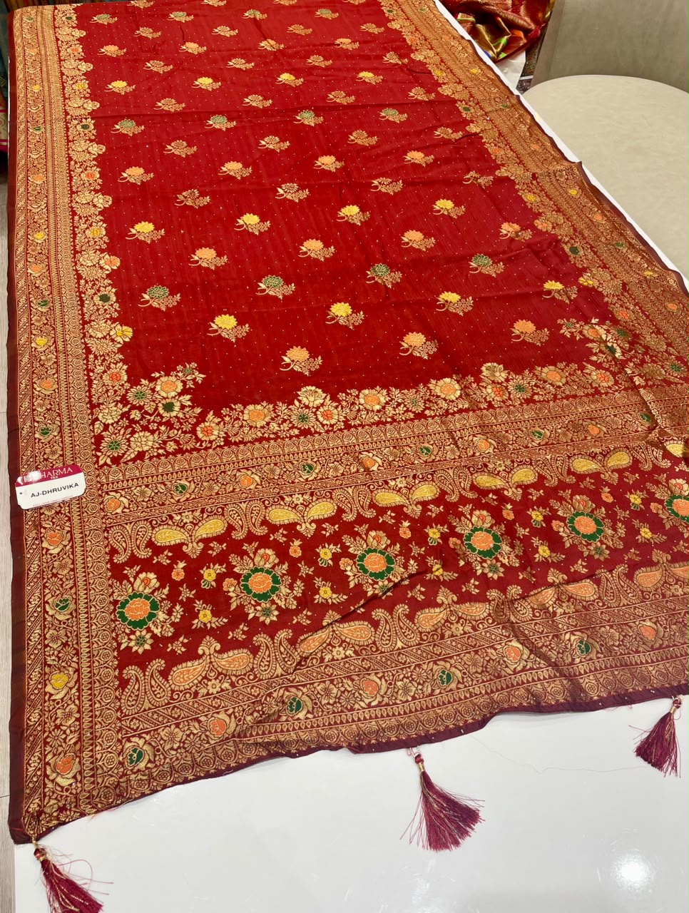 AJ-DHRUVIKA CHAMPION SILK FABRIC SAREE WITH RICH PALLU DESIGN WITH MEENAKARI WORK WITH FLORAL DESIGN WITH BORDER WITH PIPING AND TASSELS WITH BLOUSE