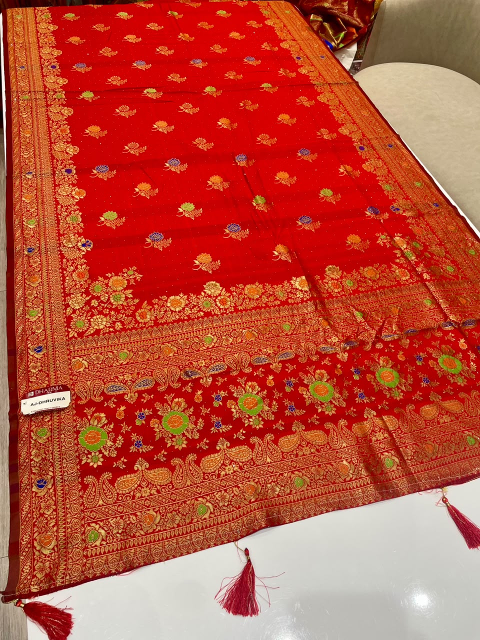 AJ-DHRUVIKA CHAMPION SILK FABRIC SAREE WITH RICH PALLU DESIGN WITH MEENAKARI WORK WITH FLORAL DESIGN WITH BORDER WITH PIPING AND TASSELS WITH BLOUSE