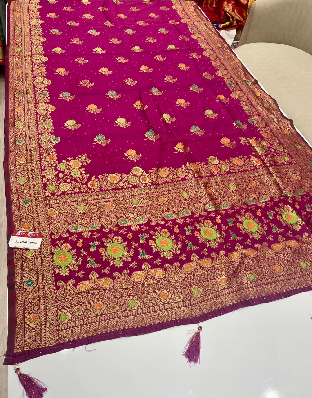 AJ-DHRUVIKA CHAMPION SILK FABRIC SAREE WITH RICH PALLU DESIGN WITH MEENAKARI WORK WITH FLORAL DESIGN WITH BORDER WITH PIPING AND TASSELS WITH BLOUSE
