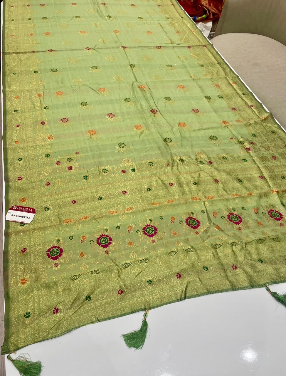 AJ-DHRUVIKA CHAMPION SILK FABRIC SAREE WITH RICH PALLU DESIGN WITH MEENAKARI WORK WITH FLORAL DESIGN WITH BORDER WITH PIPING AND TASSELS WITH BLOUSE