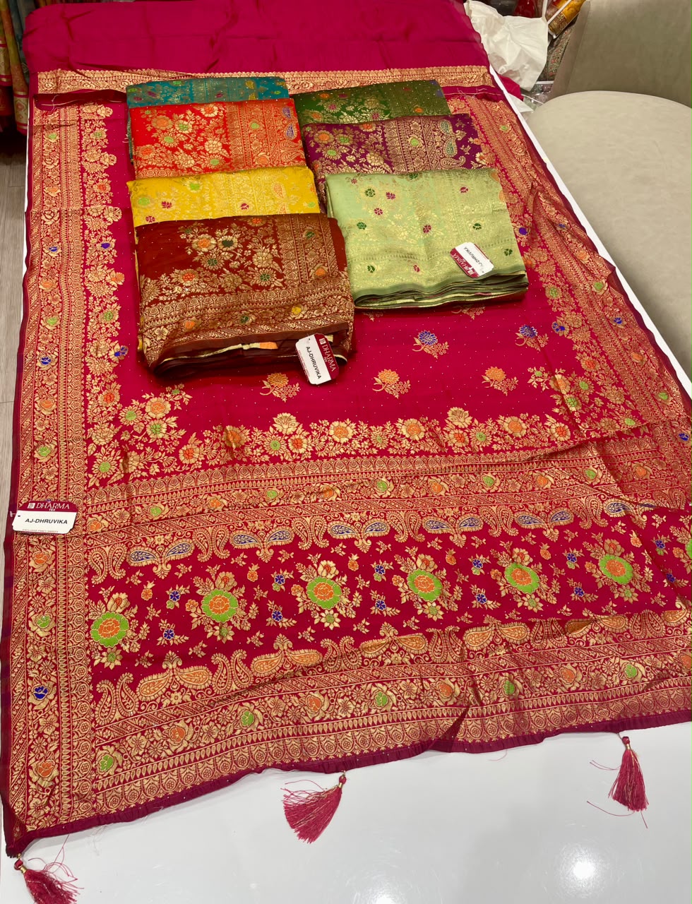 AJ-DHRUVIKA CHAMPION SILK FABRIC SAREE WITH RICH PALLU DESIGN WITH MEENAKARI WORK WITH FLORAL DESIGN WITH BORDER WITH PIPING AND TASSELS WITH BLOUSE