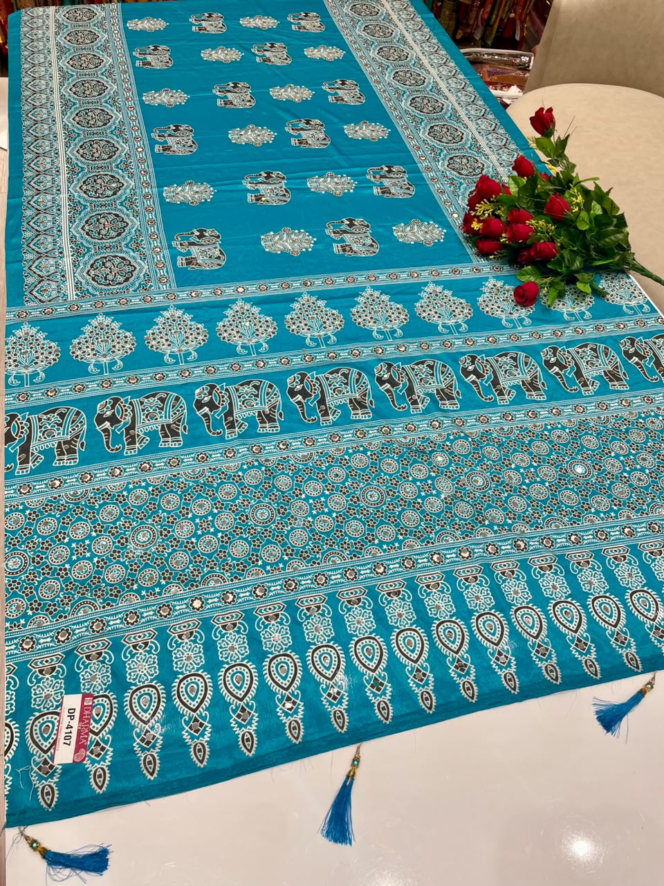DP-4107 CHINON FABRIC SAREE WITH BEAUTIFUL GAJRAJ DESIGN WITH AJRAKH PRINT SAREE WITH MIRROR WORK WITH TASSELS WITH BLOUSE