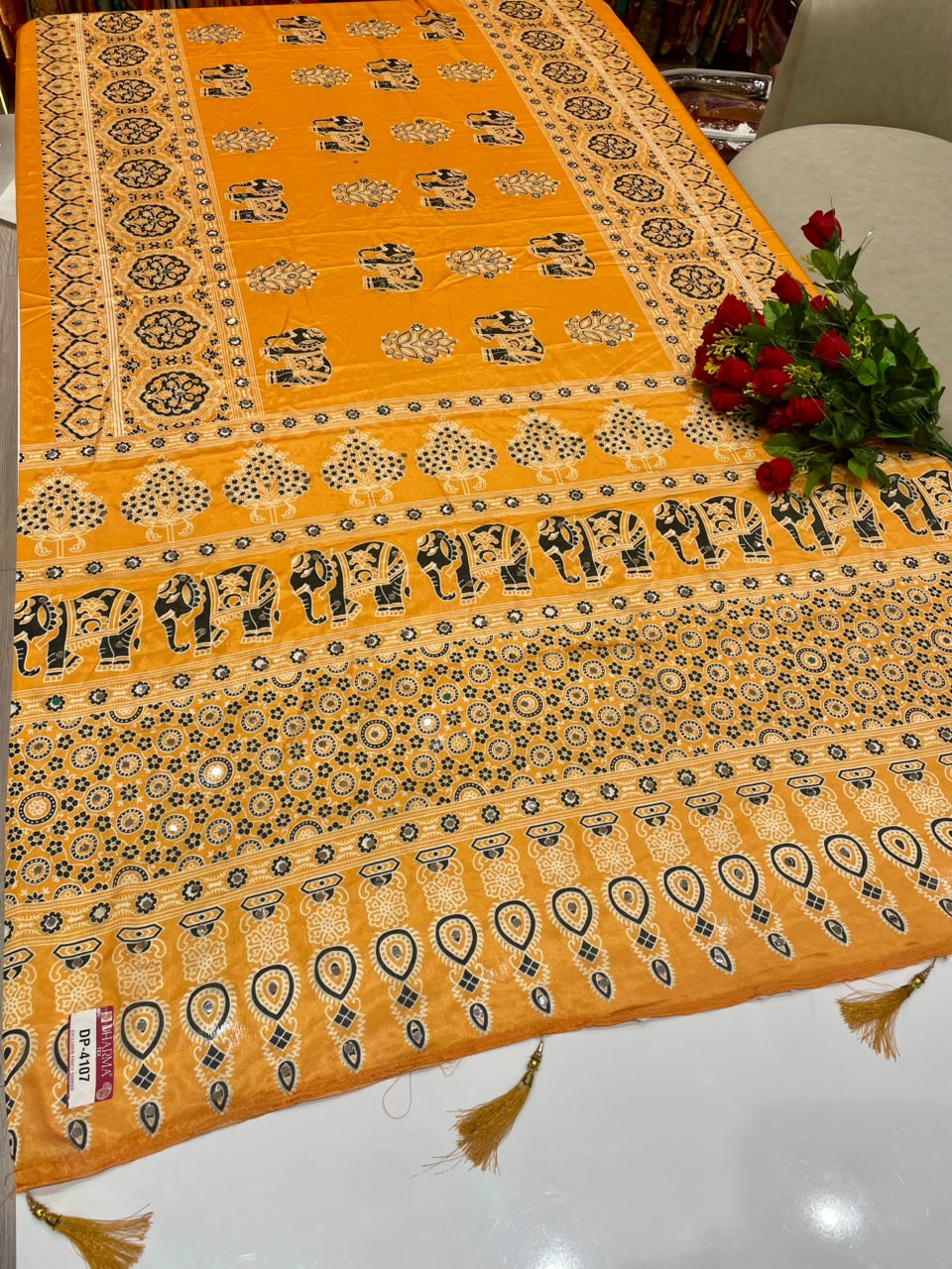 DP-4107 CHINON FABRIC SAREE WITH BEAUTIFUL GAJRAJ DESIGN WITH AJRAKH PRINT SAREE WITH MIRROR WORK WITH TASSELS WITH BLOUSE