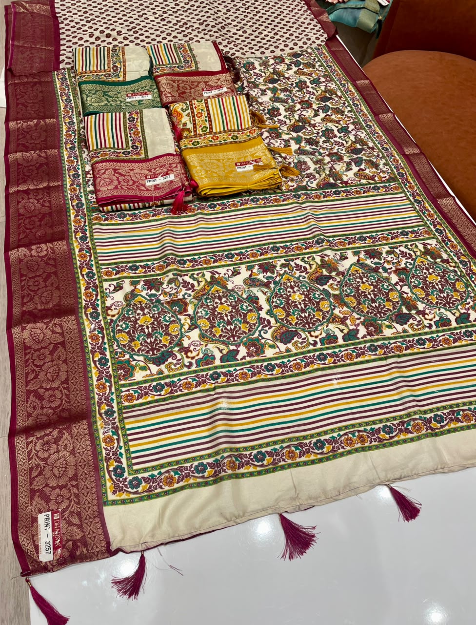 PRINT-3257 DOLA JACUARD FABRIC SAREE WITH WHITE COMMON AND RICH PALLU DESIGN WITH BEAUTIFUL KASHMIRI PATTERN DESIGN WITH 6.30 MTR CUT WITH BUTTI BLOUSE AND TASSELS
